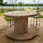 Country high table from a wooden coil