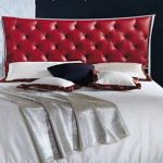 Bed with burgundy headboard with four-sided tie
