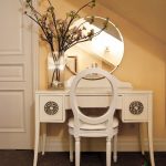 Round mirror and small dressing table