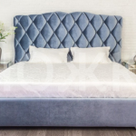 Soft double bed with a headboard - a carriage coupler