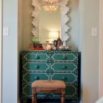 A small niche with a turquoise vanity table