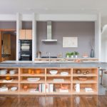 Unusual wooden kitchen without top cabinets