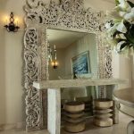 Unusual console table at the large mirror