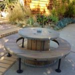 Unusual homemade table and benches round shape