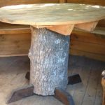 A simple round table of scrap materials to give
