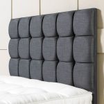 Gray headboard with cushions