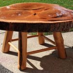Table from a cut of a tree on 4 legs