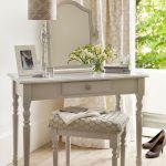 Dressing table milky color in the interior of the bedroom