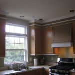 Tall cabinets with curbing to the ceiling