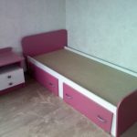 Bed from a chipboard for the girl with own hands