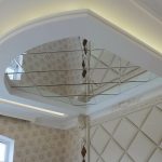 Decorative mirror ceiling in the bedroom