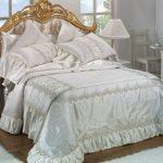 Snow-white silk bedspread with pillows