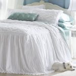 Snow-white elongated bedspread