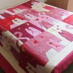 Interesting homemade bedspread with kittens