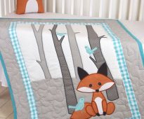 Set in bed with foxes - a blanket and pillow