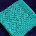 Beautiful turquoise blanket on an extract from the hospital