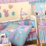 Beautiful bed set with a blanket in the baby's cot