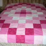 Patchwork bedspread in shades of pink