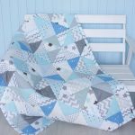 Blanket for a newborn boy in the style of patchwork Cloud