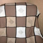 Plaid in cream and pastel colors, knitting
