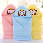Multi-colored blankets with a monkey corner