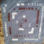 Multicolored children's blanket with mazes
