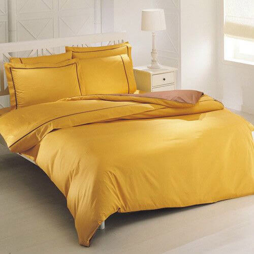 Yellow satin bedding