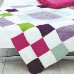 Chess plaid with multicolored knitted squares