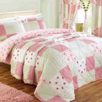Quilted bedspread and curtains for a romantic interior