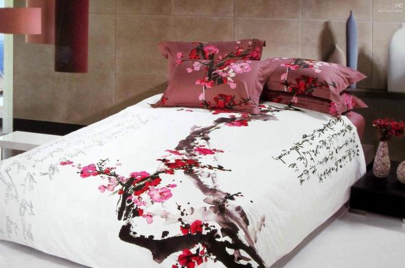 Bright colorful bedspread with sakura
