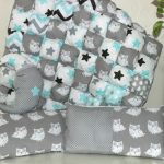 Baby quilt and pillows in patchwork technique