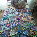 Beautiful plaid of crocheted triangles
