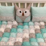 Handmade bonbon blankets and pillows with owls for the crib