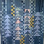 Fir-tree quilt from patchwork jeans
