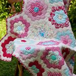 Quilt from small hexagons in patchwork technique