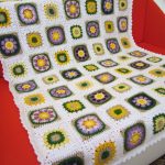 Plaid Flower meadow on a white background for the sofa