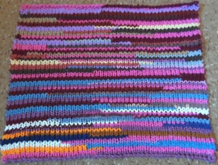 Multi-colored knitting rug