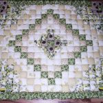 Quilt in green and beige color
