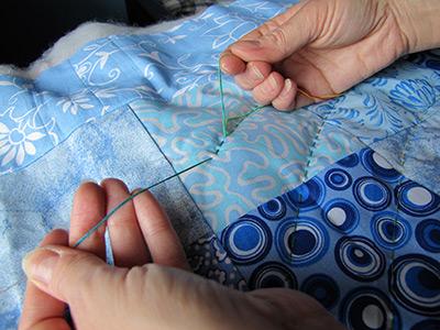 Manual blanket stitch