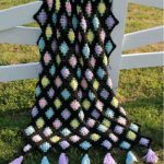 Bright flowers for black crochet bedspread