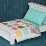 White doll bed with bed