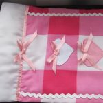 Beautiful doll bed with bows and hearts