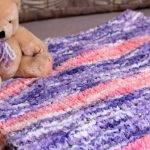 Soft and gentle bright blanket suitable for a newborn