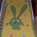 Plaid on the crib with smesharikom bunny