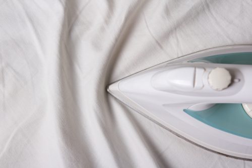 Ironing sheets with elastic