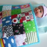 Quilt and light bedding for the doll