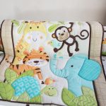 Warm blanket with young animals in the playpen