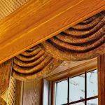 Large wooden cornice with invisible fixings for curtains