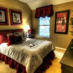Decorative burgundy elements - curtains, pillows, frames