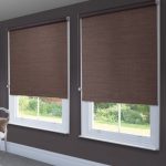 Brown blinds on white windows